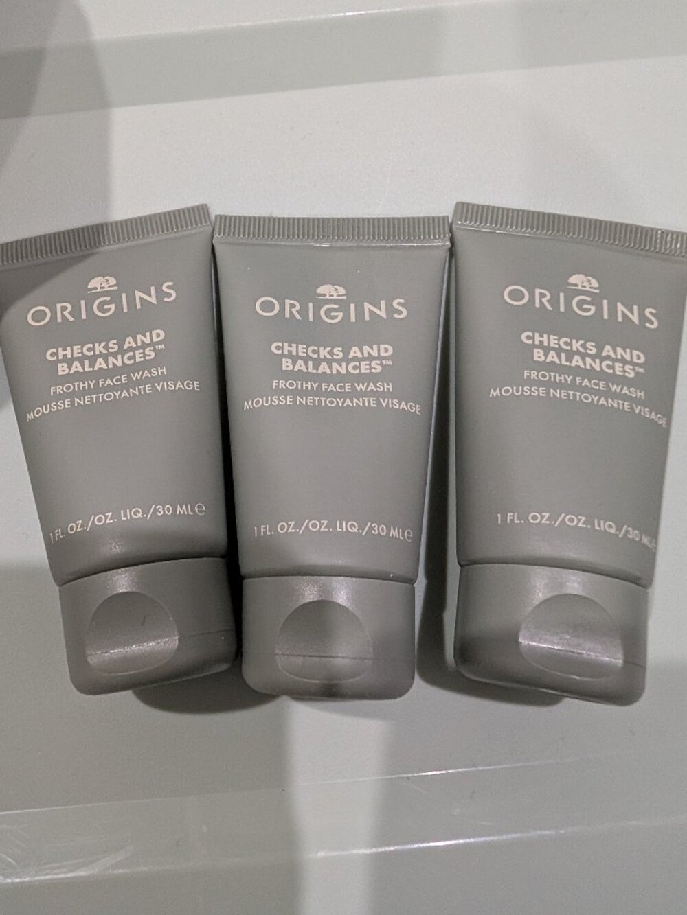 Origins checks and balances new travel sizes